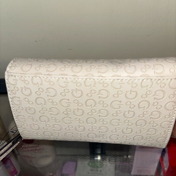 GUESS Cream Logo-Embossed Wristlet Wallet - Picture 10 of 10